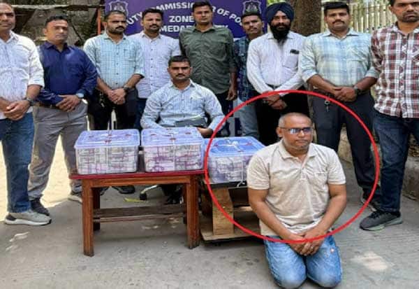 ஆமதாபாத் வங்கியில் 8 கோடி ரூபாய் மோசடி: பாதுகாவலர் கைது